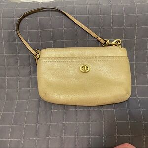 Coach  Gold Women's wristlet